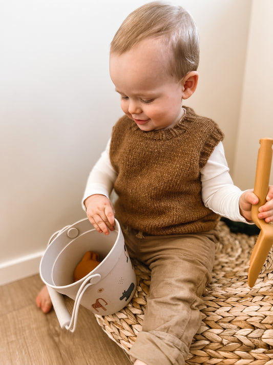 KOS Slipover och Mössa